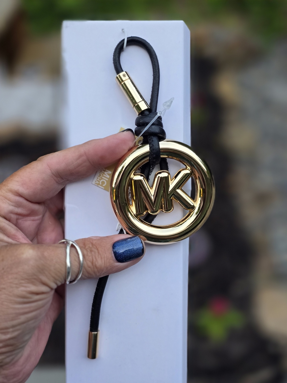 Michael Kors Gold MK Chunky Medallian On Black Leather Hangtag